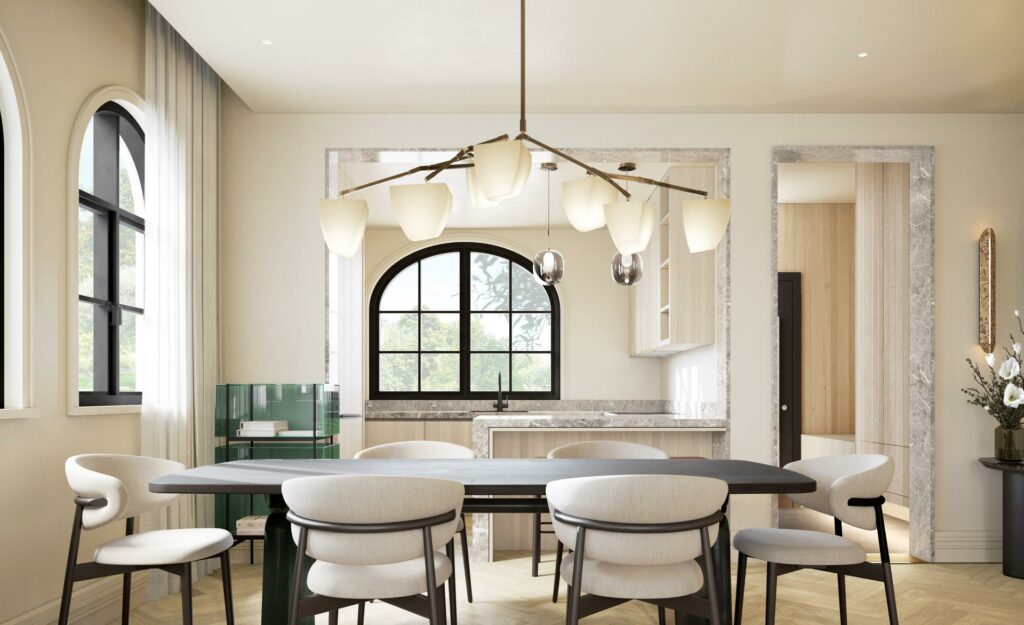 The dining area, adorned with lighting fixtures reminiscent of magnolia shapes, offers captivating views of the surrounding gardens, while a serene colour palette evokes a sense of timeless tranquillity.