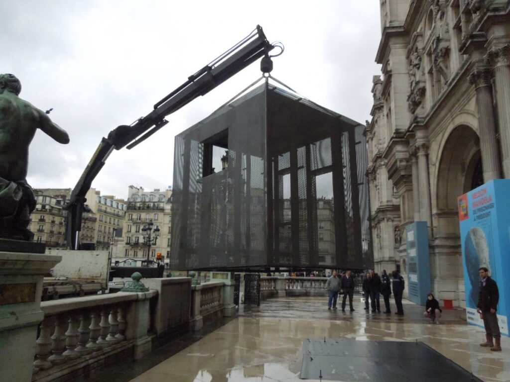 The Cell Project has emerged from several initiatives that celebrate the life of Nelson Mandela through exhibitions. In 2013, one such exhibition debuted at the Hotel de Ville under the title 'Mandela – From Prisoner to President'.